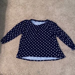 this is a navy polka dot blouse!